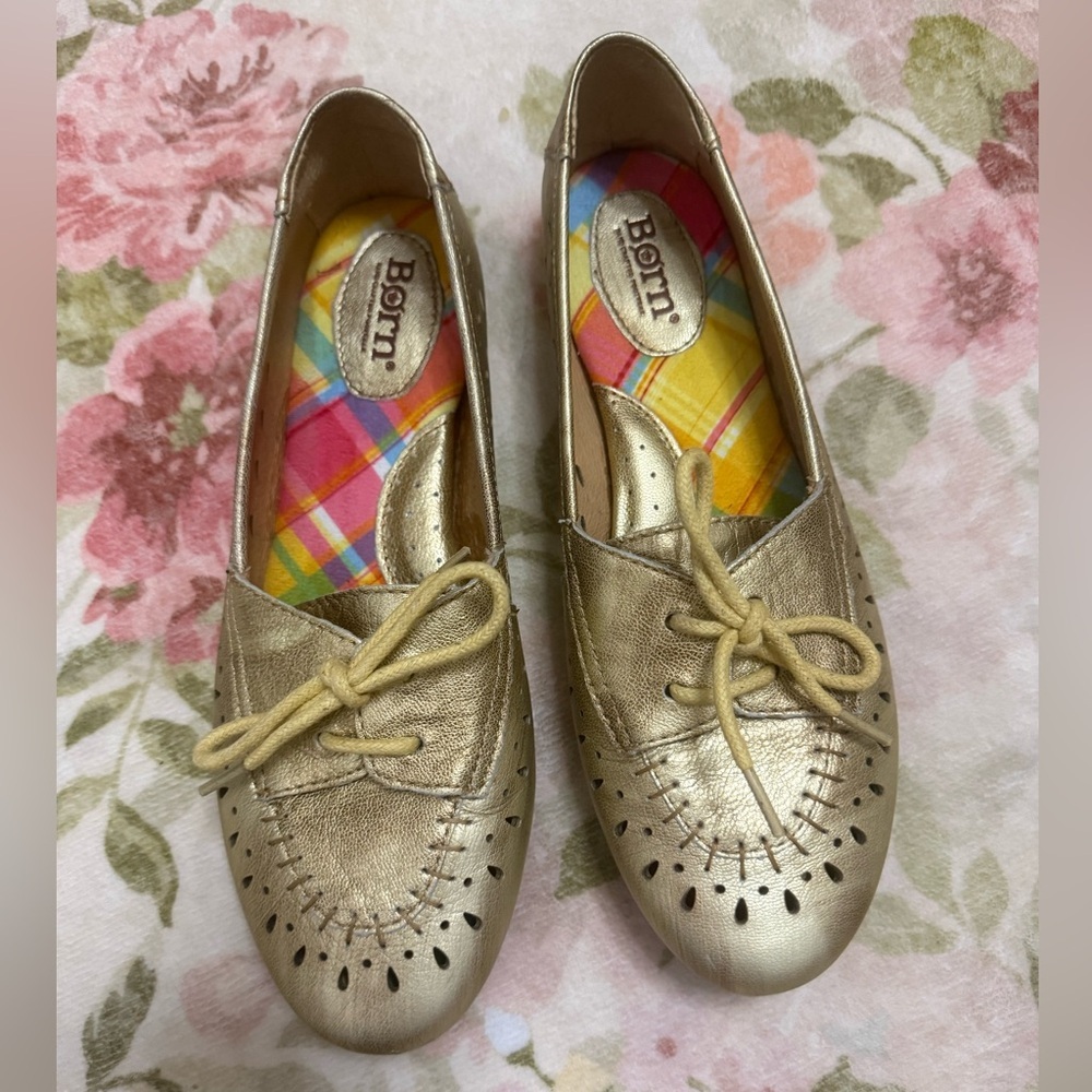 BORN gold-colored metallic leather flats